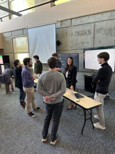 Students demo their projects to faculty.